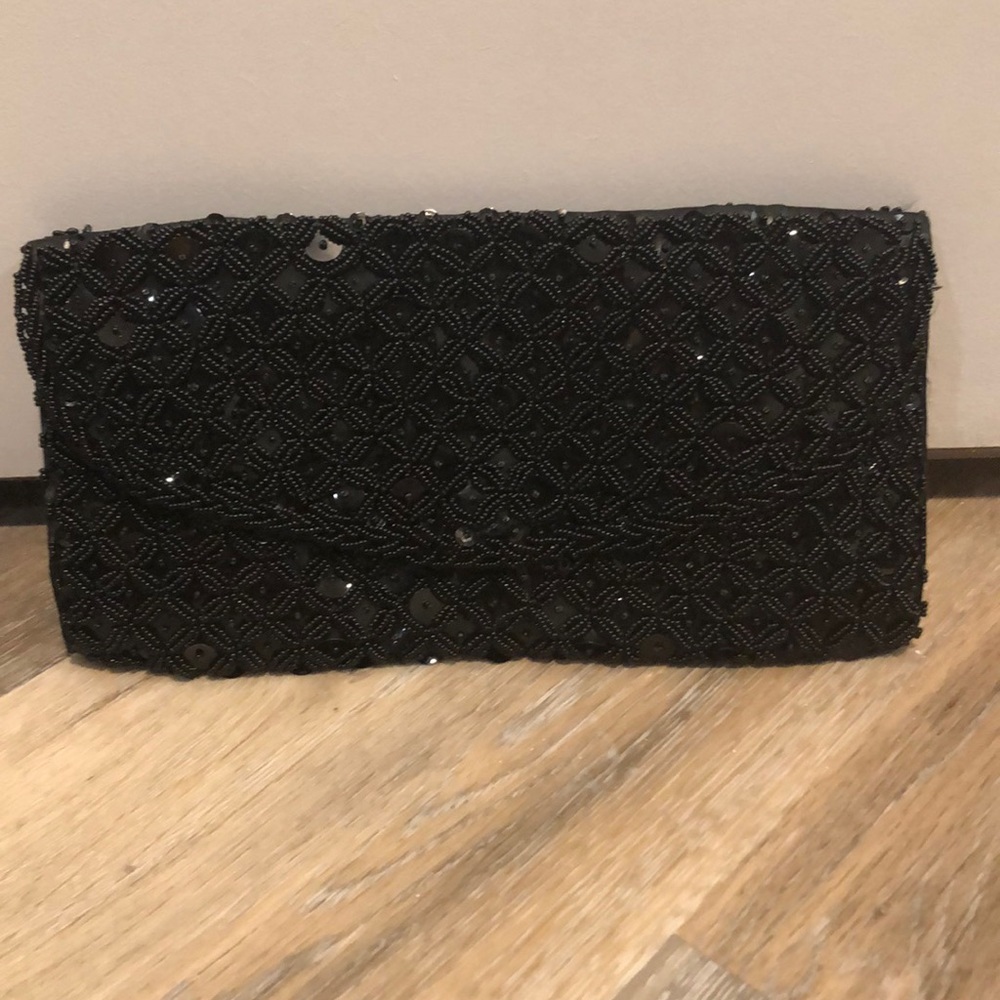 Sequined black clutch